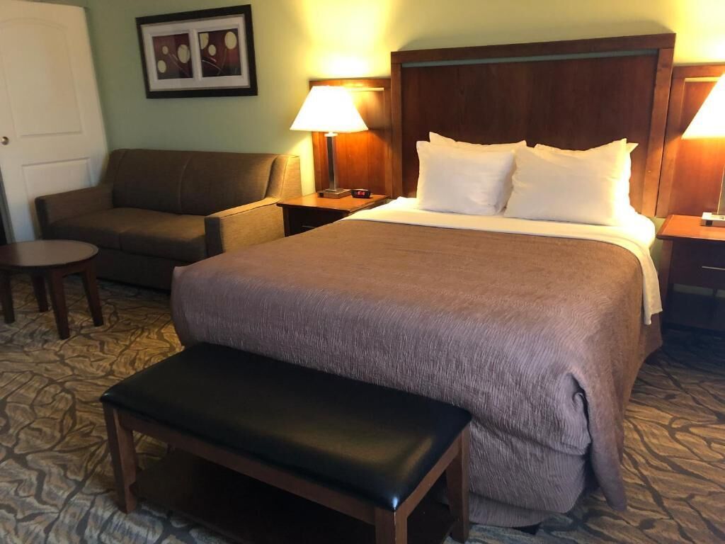 extended stay suite, 1 queen bed | living area | tv