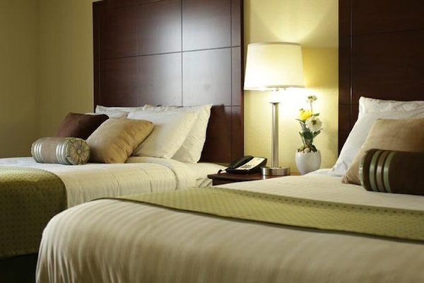 Premium bedding, desk, laptop workspace, free WiFi