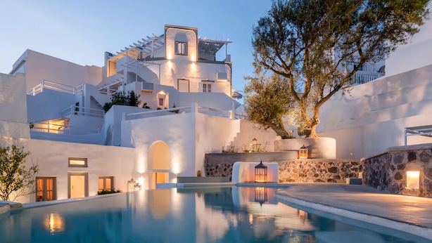 A modern hotel with a pool, white architecture, and stone walls. - Senses Boutique Hotel (Santorini)