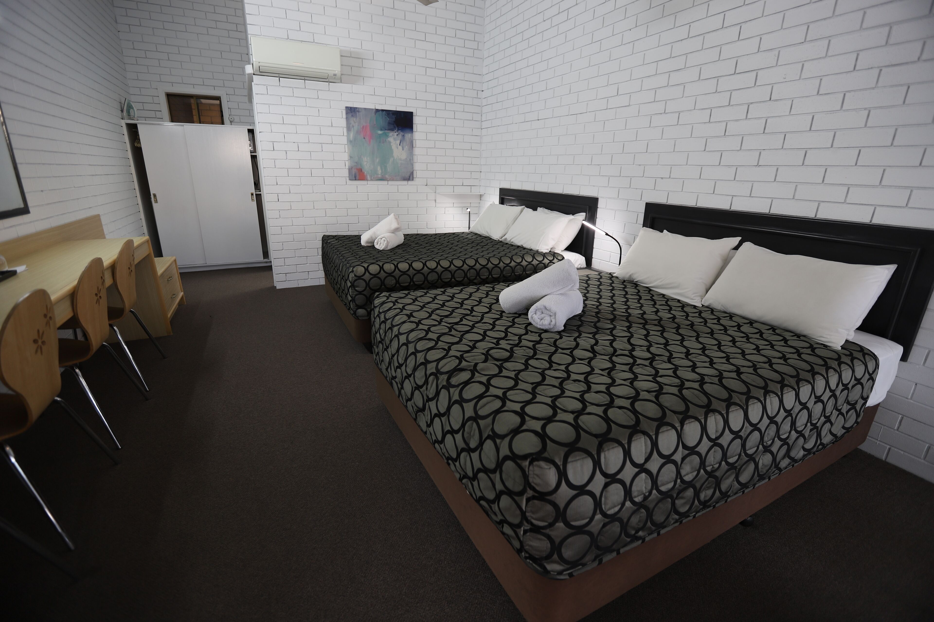 Deluxe Room, Non Smoking (Queen Twin Deluxe) | Minibar, desk, laptop workspace, soundproofing