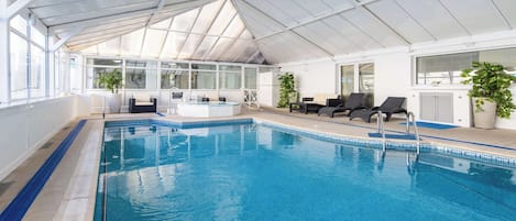 Indoor pool, seasonal outdoor pool, pool umbrellas, pool loungers