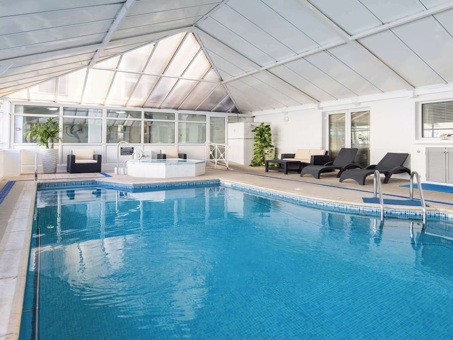 Indoor pool, seasonal outdoor pool, pool umbrellas, sun loungers
