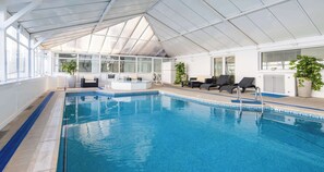 Indoor pool, seasonal outdoor pool, pool umbrellas, pool loungers