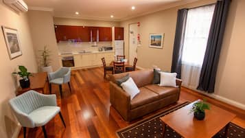 One Bedroom Apartment | Private kitchen | Full-size fridge, microwave, oven, stovetop