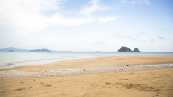 On the beach, beach towels