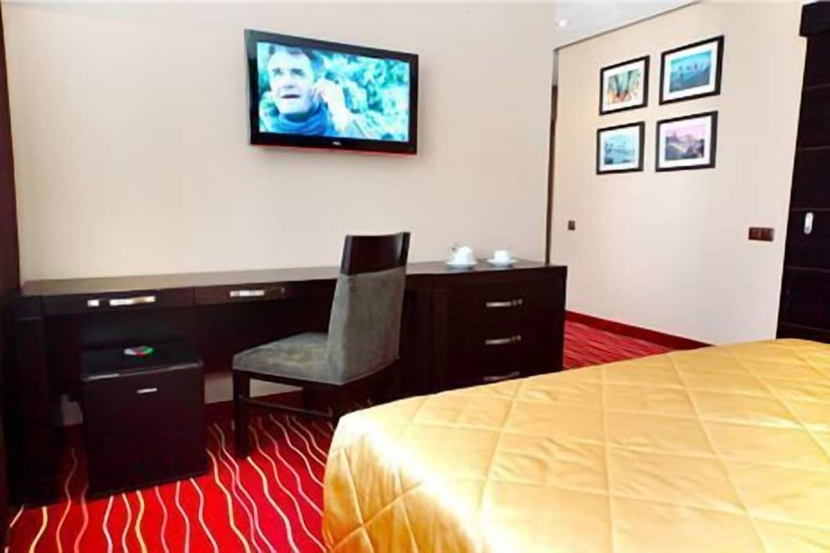 Familie suite | Luxe beddengoed, een minibar, een kluis op de kamer, geluiddichte muren