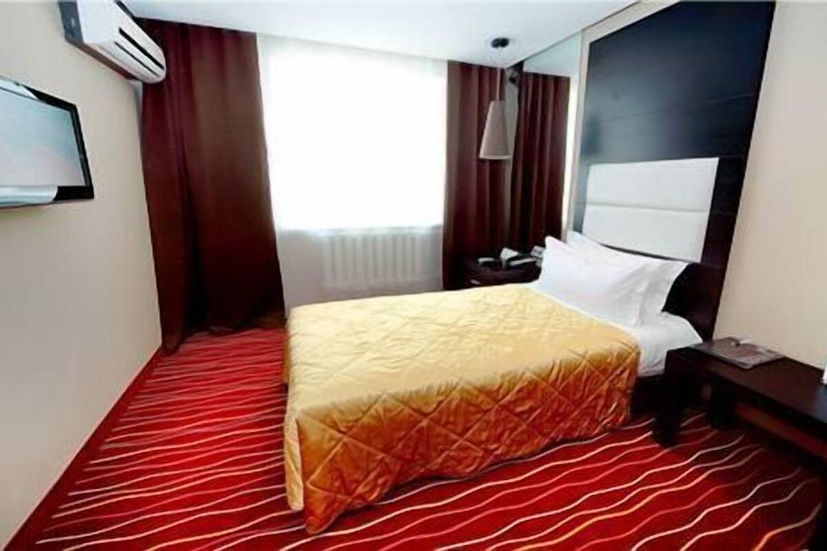 Standaard tweepersoonskamer | Luxe beddengoed, een minibar, een kluis op de kamer, geluiddichte muren