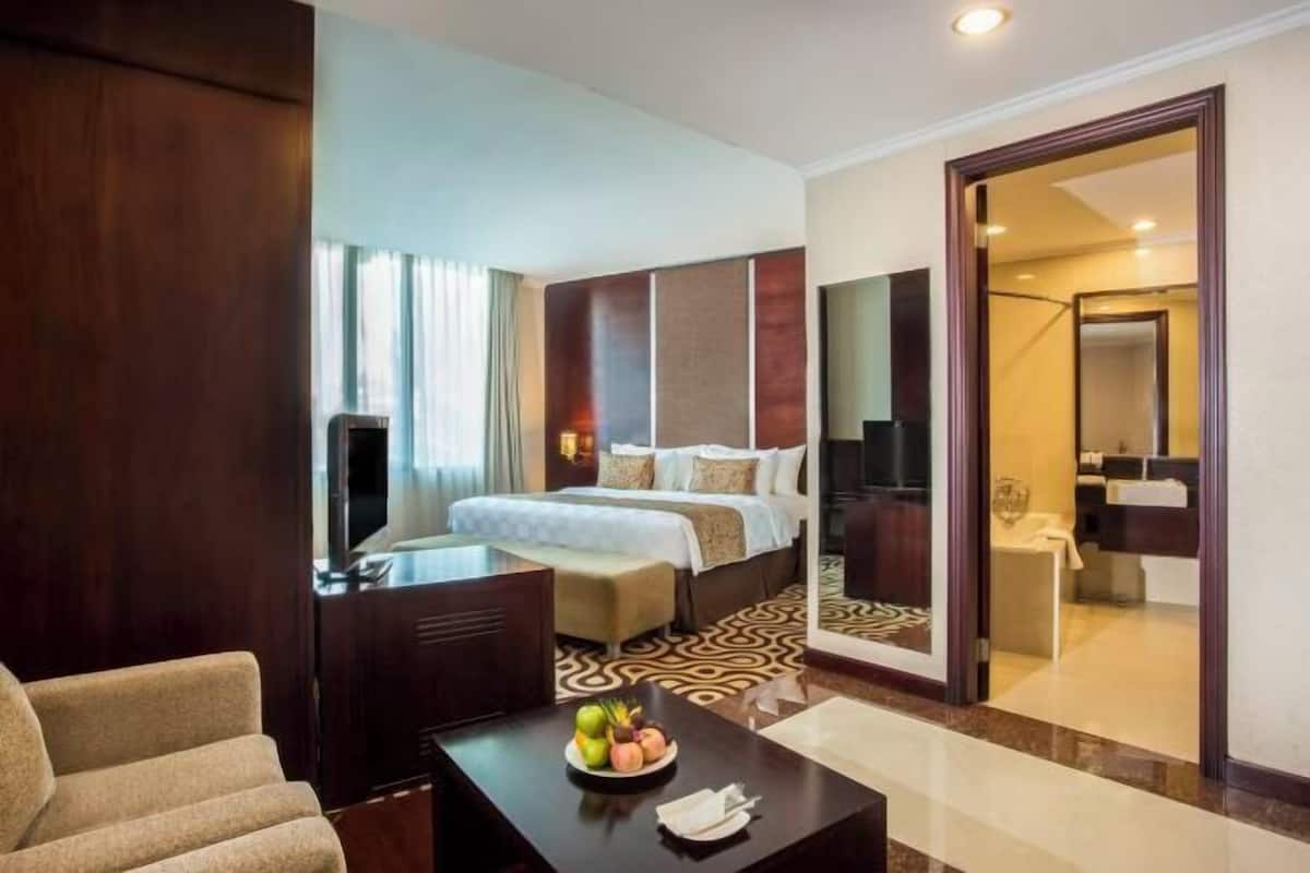 Minibar, desk, blackout drapes, iron/ironing board