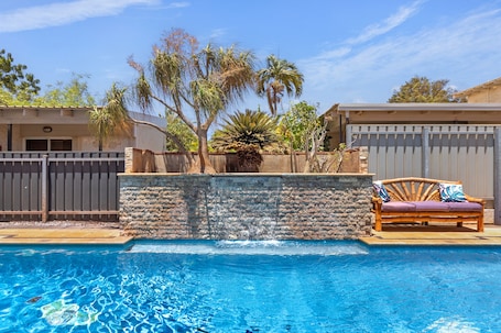 Outdoor pool, pool loungers. Point Samson Resort