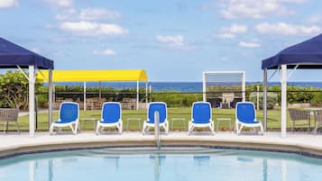 Outdoor pool, open 6:00 AM to 7:30 PM, free cabanas, pool umbrellas