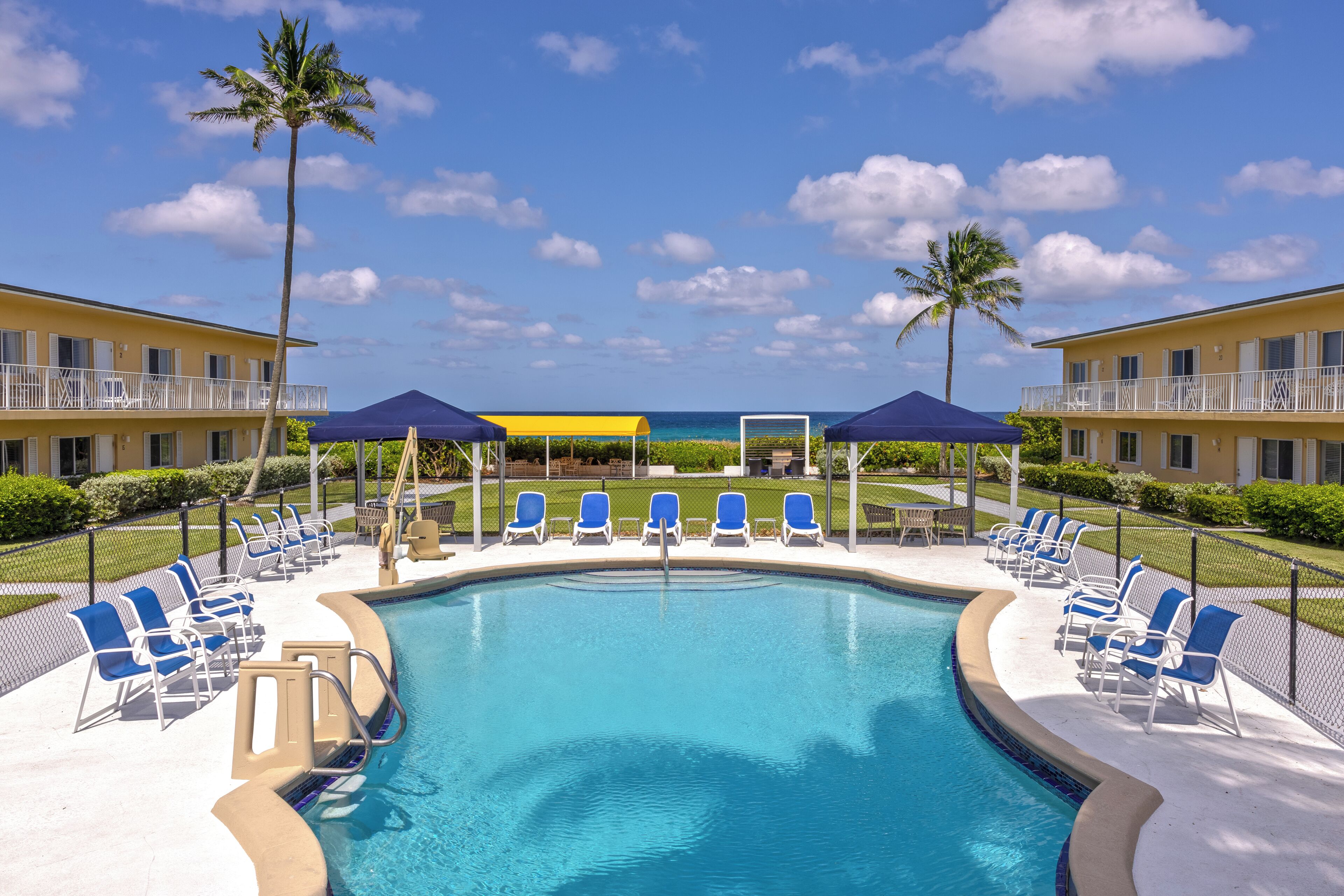 Outdoor pool, open 6:00 AM to 7:30 PM, free cabanas, pool umbrellas