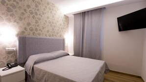 1 غرفة نوم وملاءات من القطن المصري وأغطية فراش متميزة وميني بار