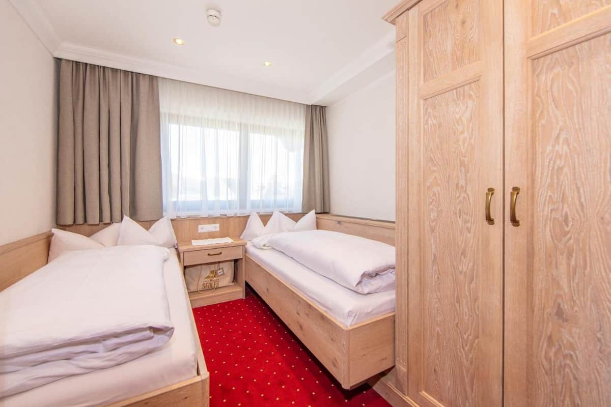 premium bedding, down duvets, pillow-top beds, in-room safe