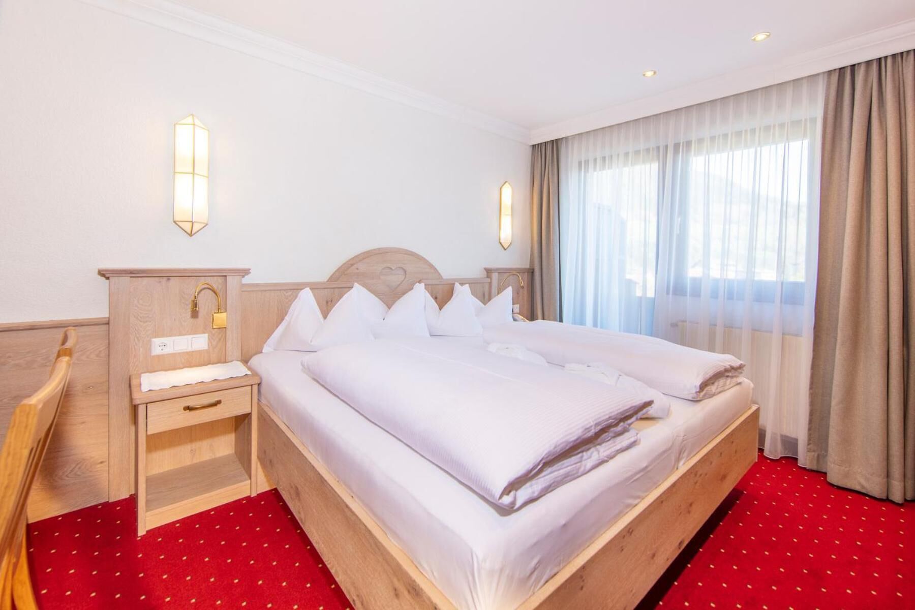 premium bedding, down duvets, pillow-top beds, in-room safe