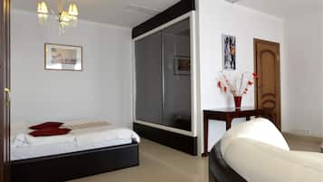 Estudio Deluxe, vista a la ciudad | Ropa de cama de alta calidad, edredón y minibar