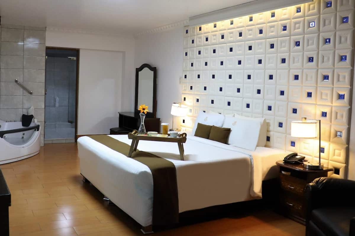 1 dormitorio, edredones de plumas, minibar y caja fuerte