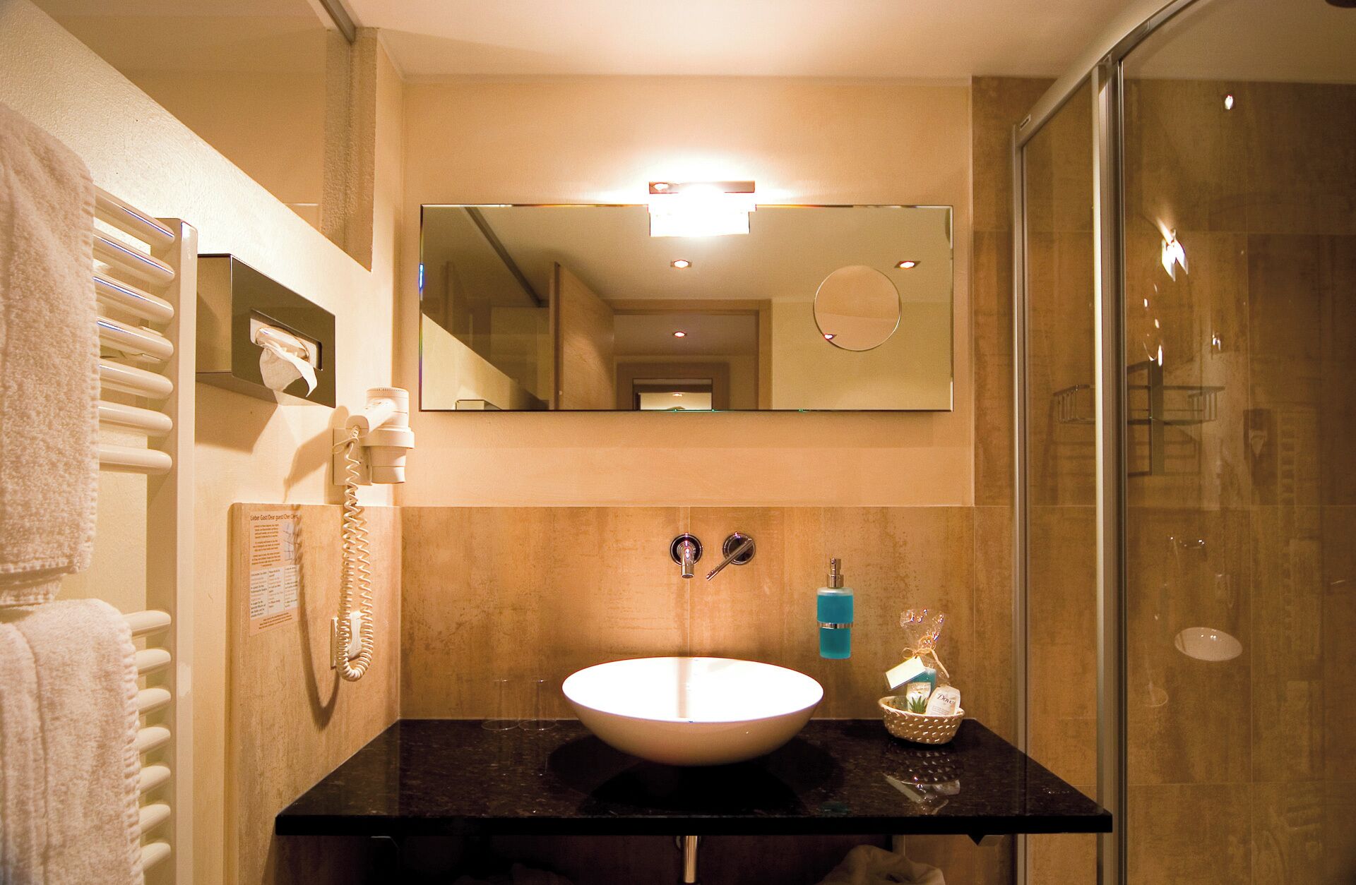 junior suite | bathroom | free toiletries, hair dryer, bathrobes, towels