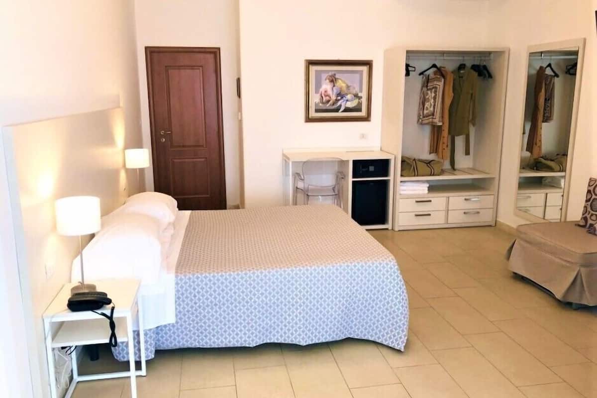 superior triple room, ocean view | minibar, in-room safe, desk, soundproofing