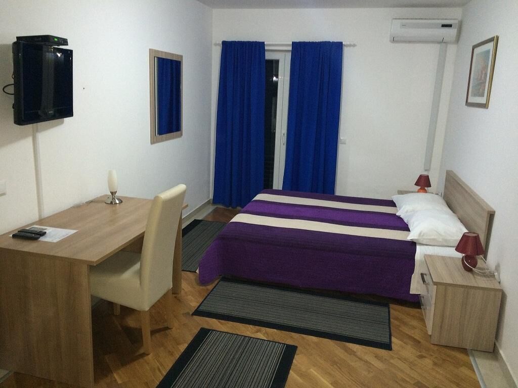 Premium bedding, memory-foam beds, in-room safe, desk
