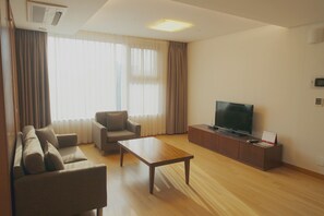 Deluxe Suite, 2 Bedrooms | Living area | Flat-screen TV, DVD player - Vabien Suite 1 Serviced Residence (Seoul)