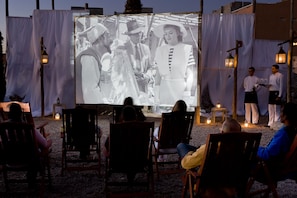 Guests can enjoy outdoor events with a large screen display.
