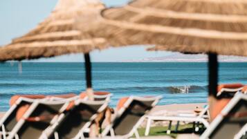 Private beach, sun loungers, beach umbrellas, beach towels