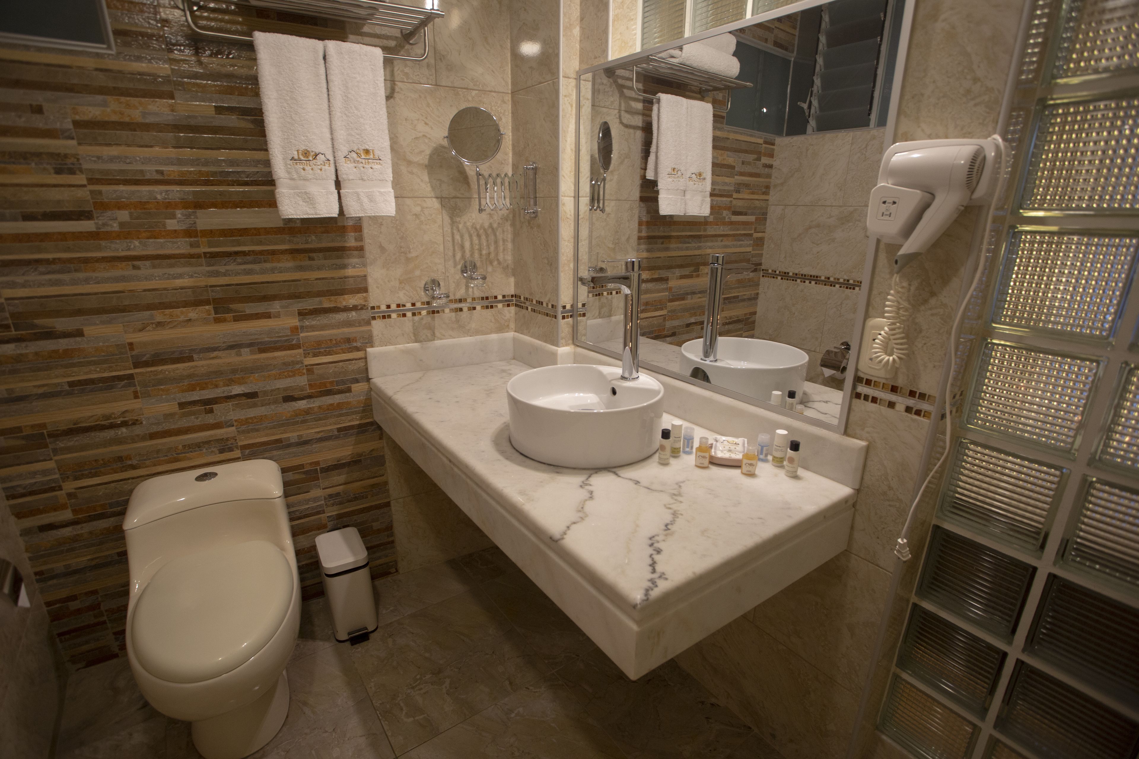 double room | bathroom | deep-soaking bathtub, rainfall showerhead, free toiletries, hair dryer