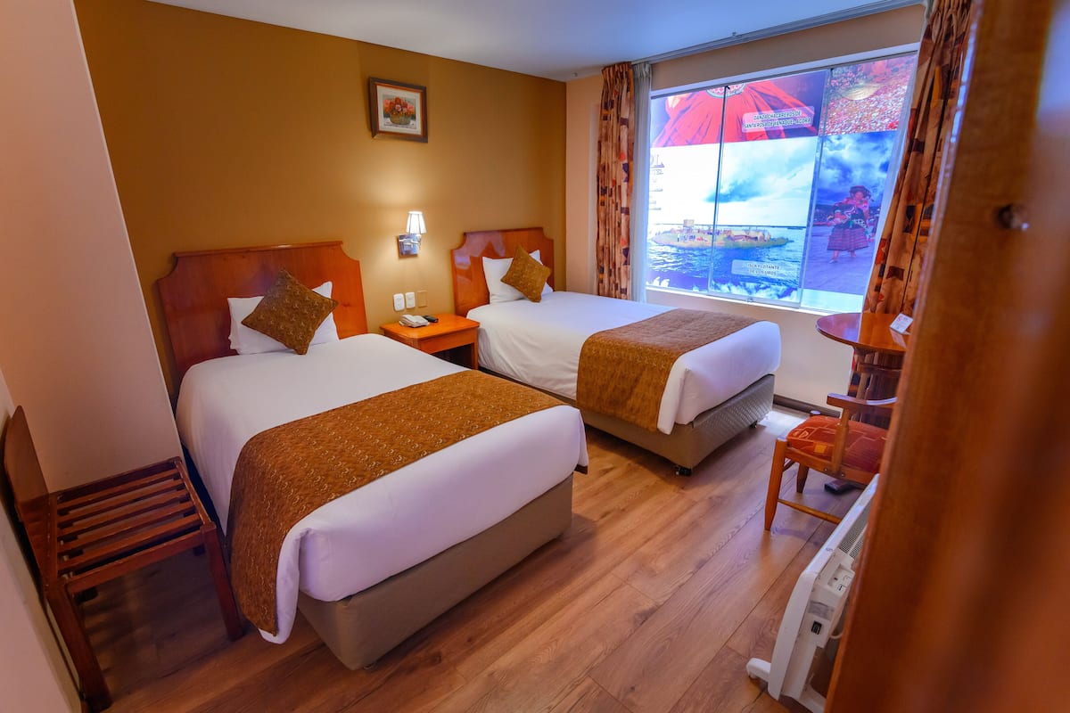 Standard Twin Room | Down comforters, minibar, in-room safe, individually furnished