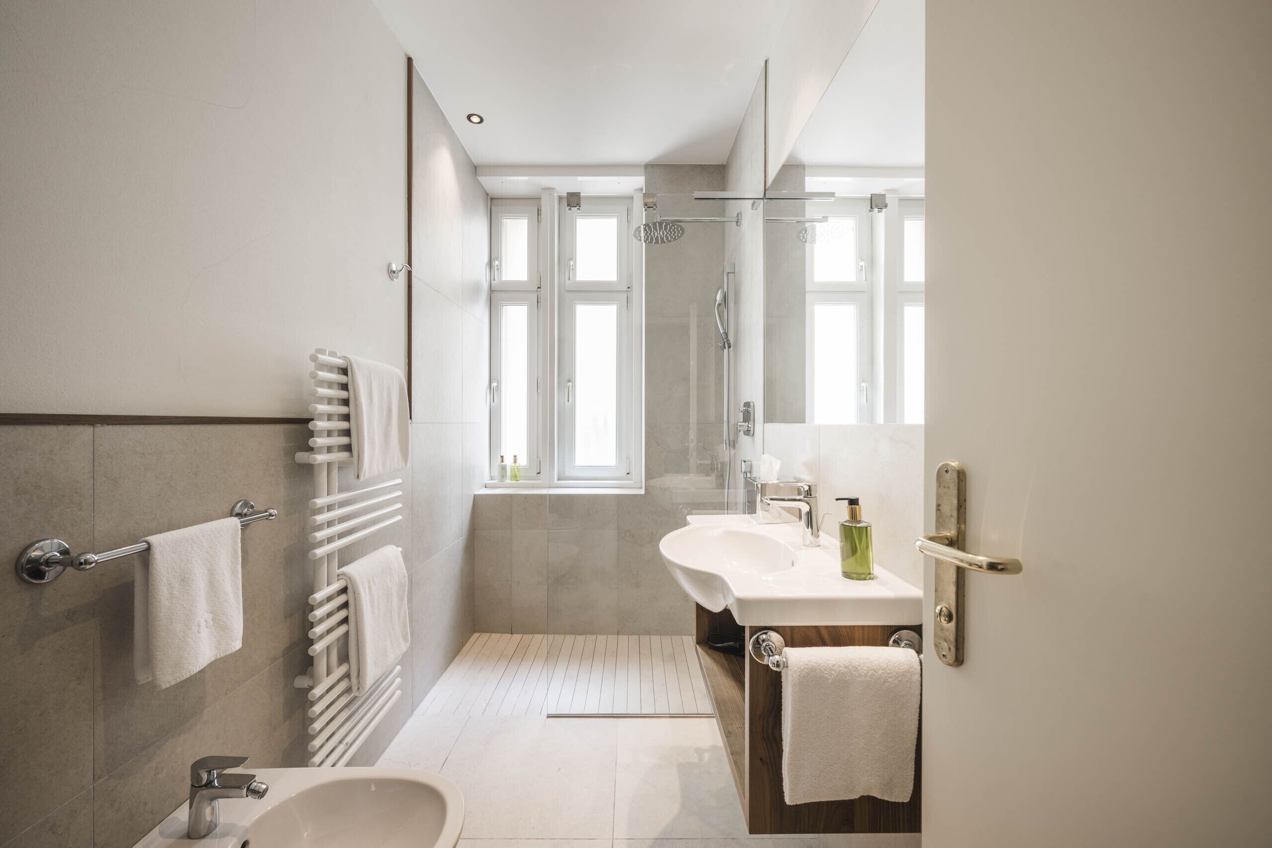 deluxe double room, 1 double bed | bathroom | shower, free toiletries, hair dryer, bathrobes