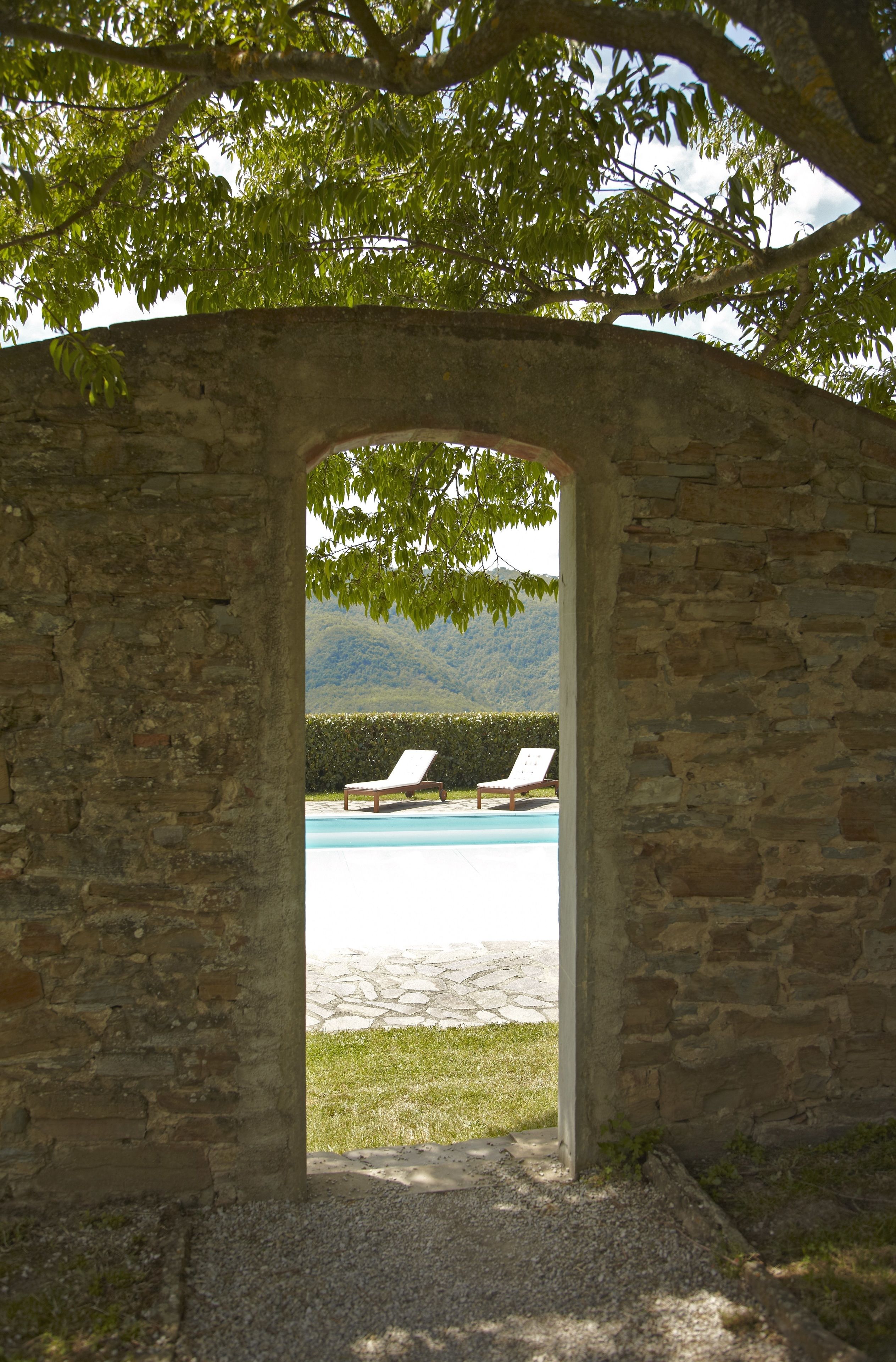 Seasonal outdoor pool, open 10:00 AM to 6:00 PM, pool umbrellas