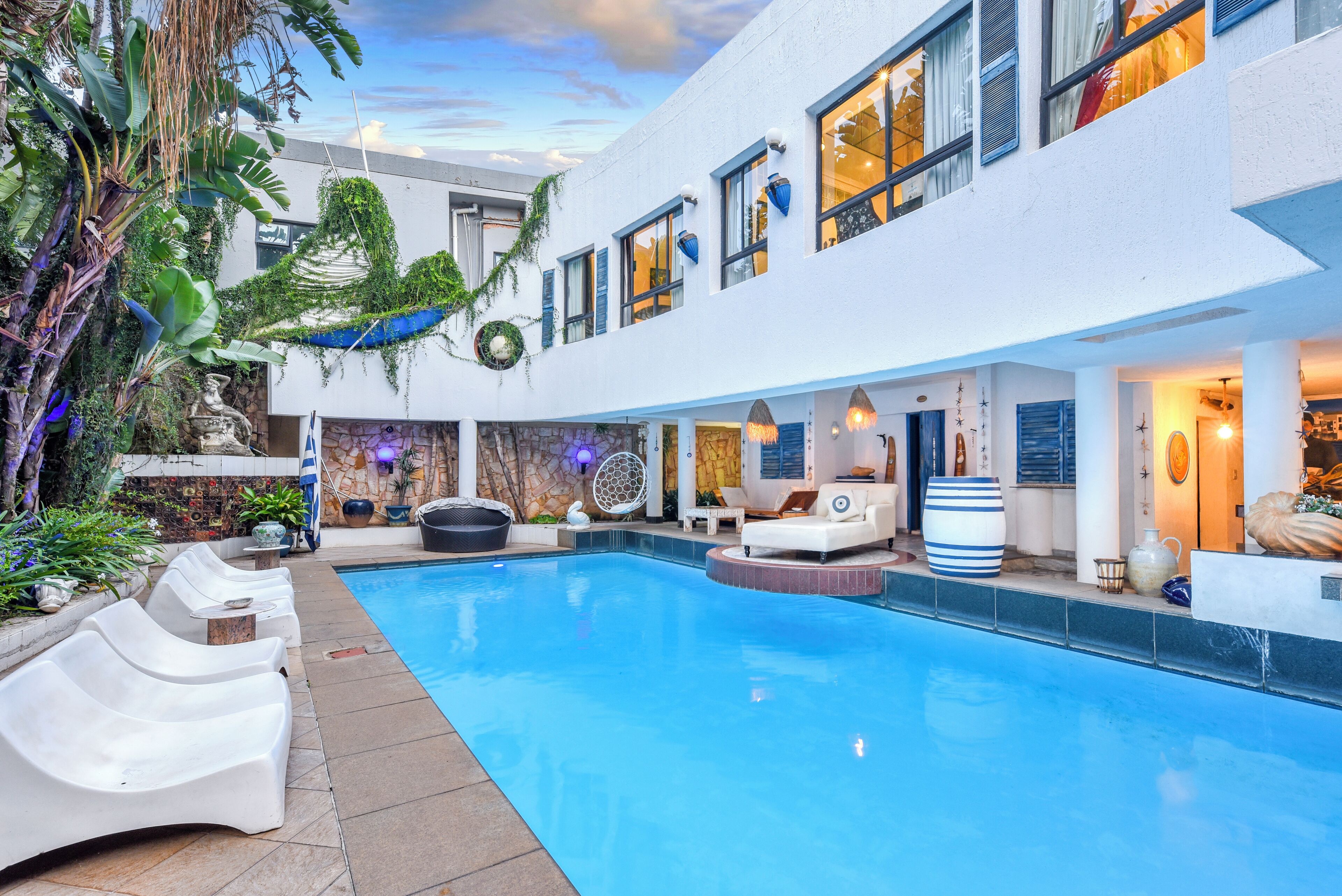 Outdoor pool, pool umbrellas, sun loungers