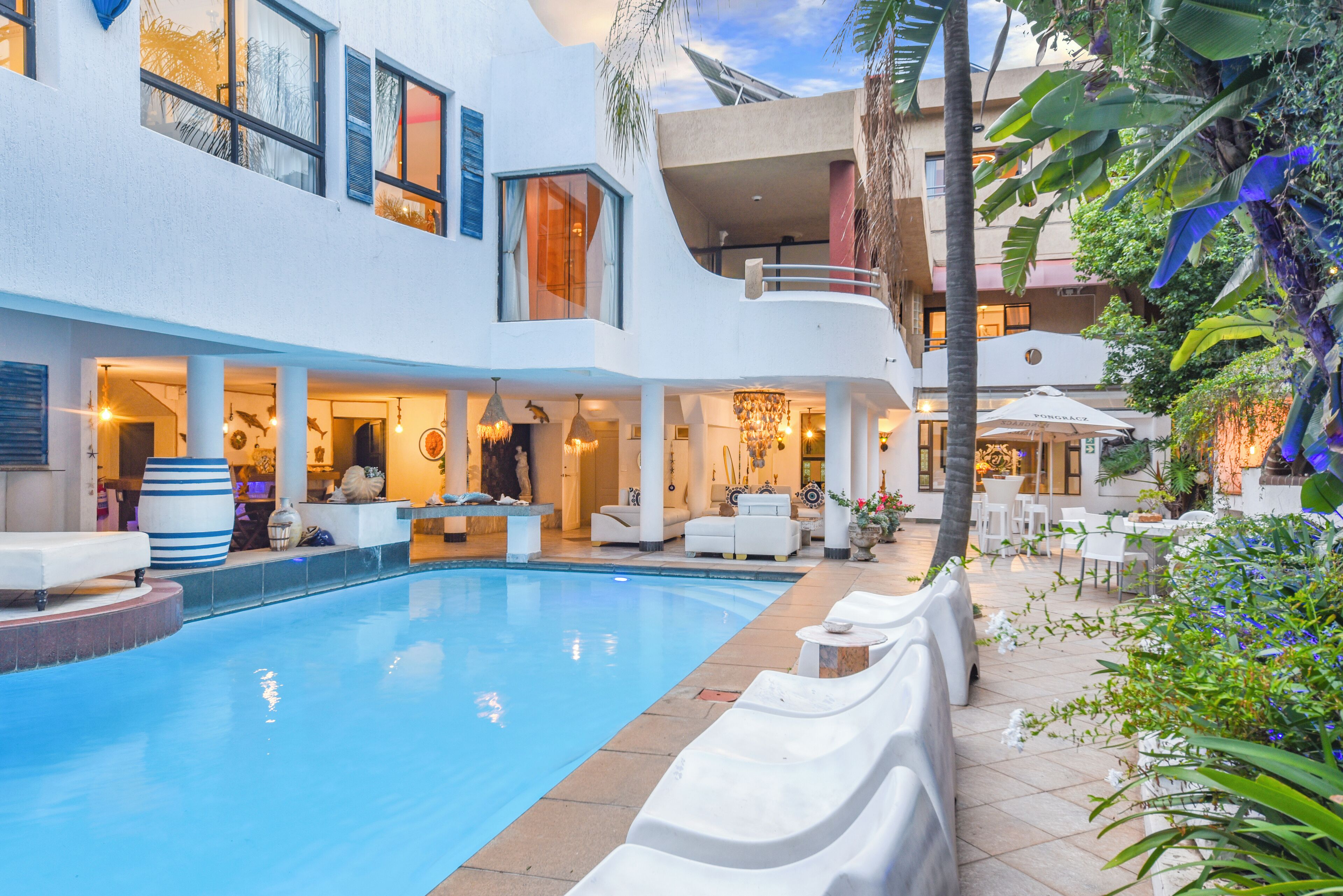 Outdoor pool, pool umbrellas, sun loungers