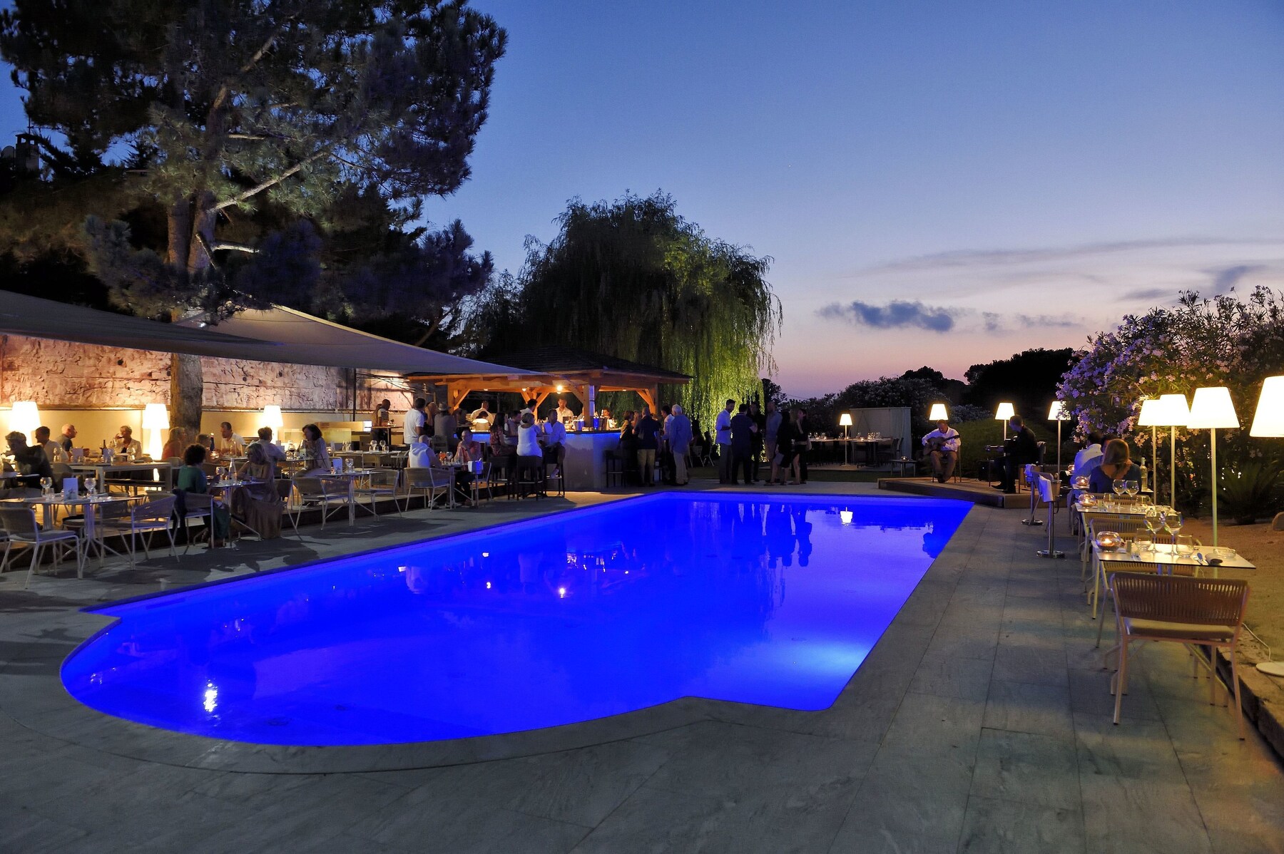 2 outdoor pools, open 9:00 AM to 8:00 PM, pool umbrellas, pool loungers