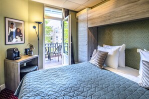 Luxe beddengoed, pillowtop-bedden, een kluis op de kamer, een bureau