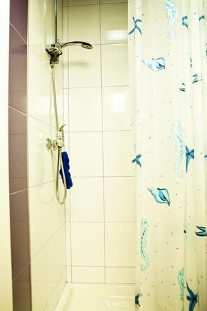 Shower, hair dryer - ZigZag Hostel (Kyiv)