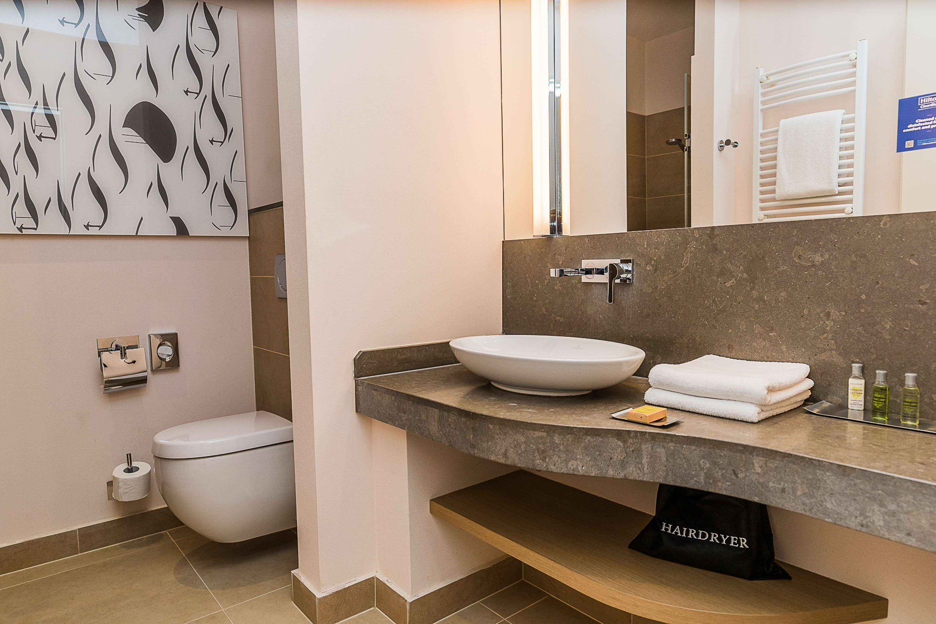 deluxe room, 1 king bed, balcony | bathroom | combined shower/bathtub, deep-soaking bathtub, free toiletries