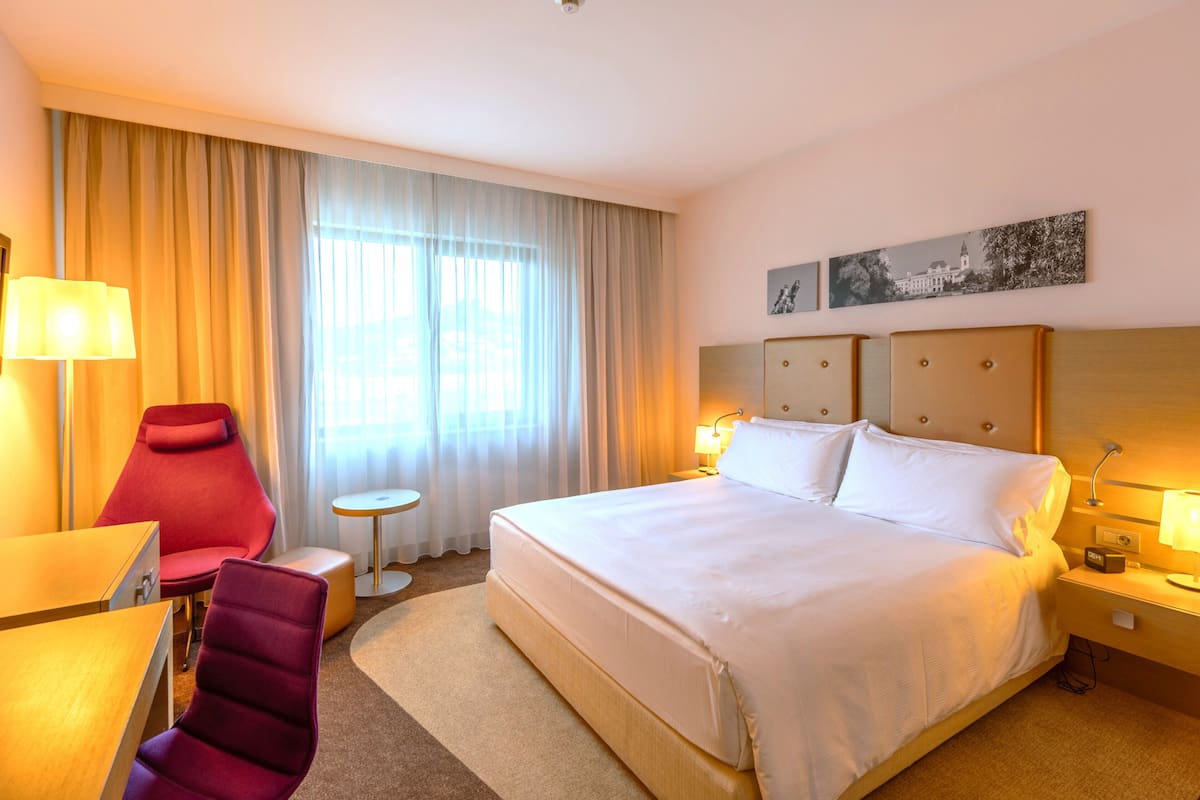 Hypo-allergenic bedding, pillow-top beds, minibar, in-room safe
