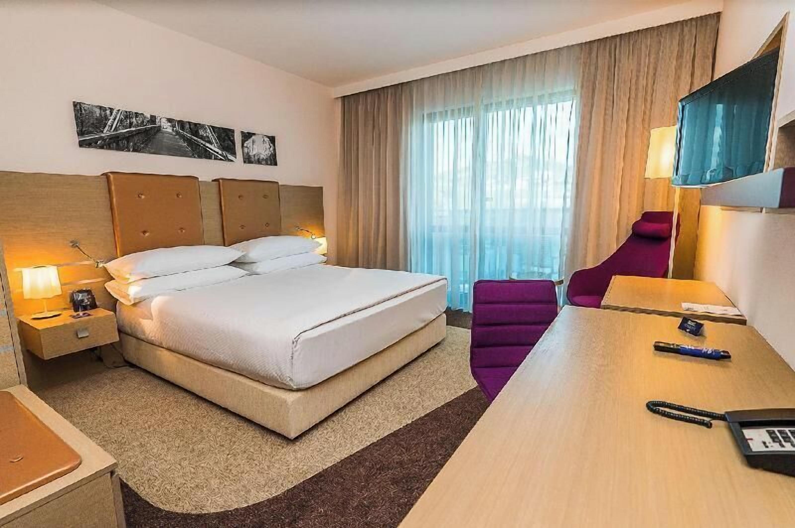 Hypo-allergenic bedding, pillowtop beds, minibar, in-room safe