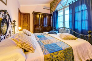 Deluxe Apartment, 2 Bedrooms, Terrace, Pool View | Soundproofing, iron/ironing board, bed sheets