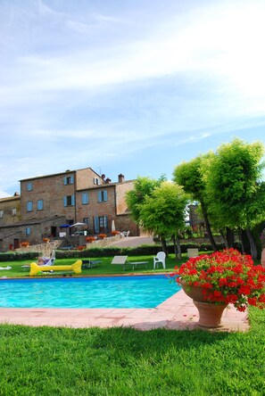 Outdoor pool, pool umbrellas, pool loungers