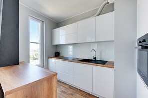 Deluxe Apartment, 1 Bedroom, Balcony (Rakoczego 9 street) | Private kitchenette | Fridge, microwave, stovetop, dishwasher
