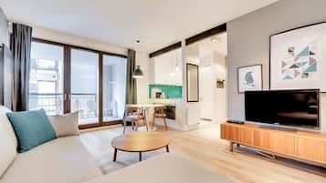 Deluxe Studio, Balcony | Living area | LCD TV