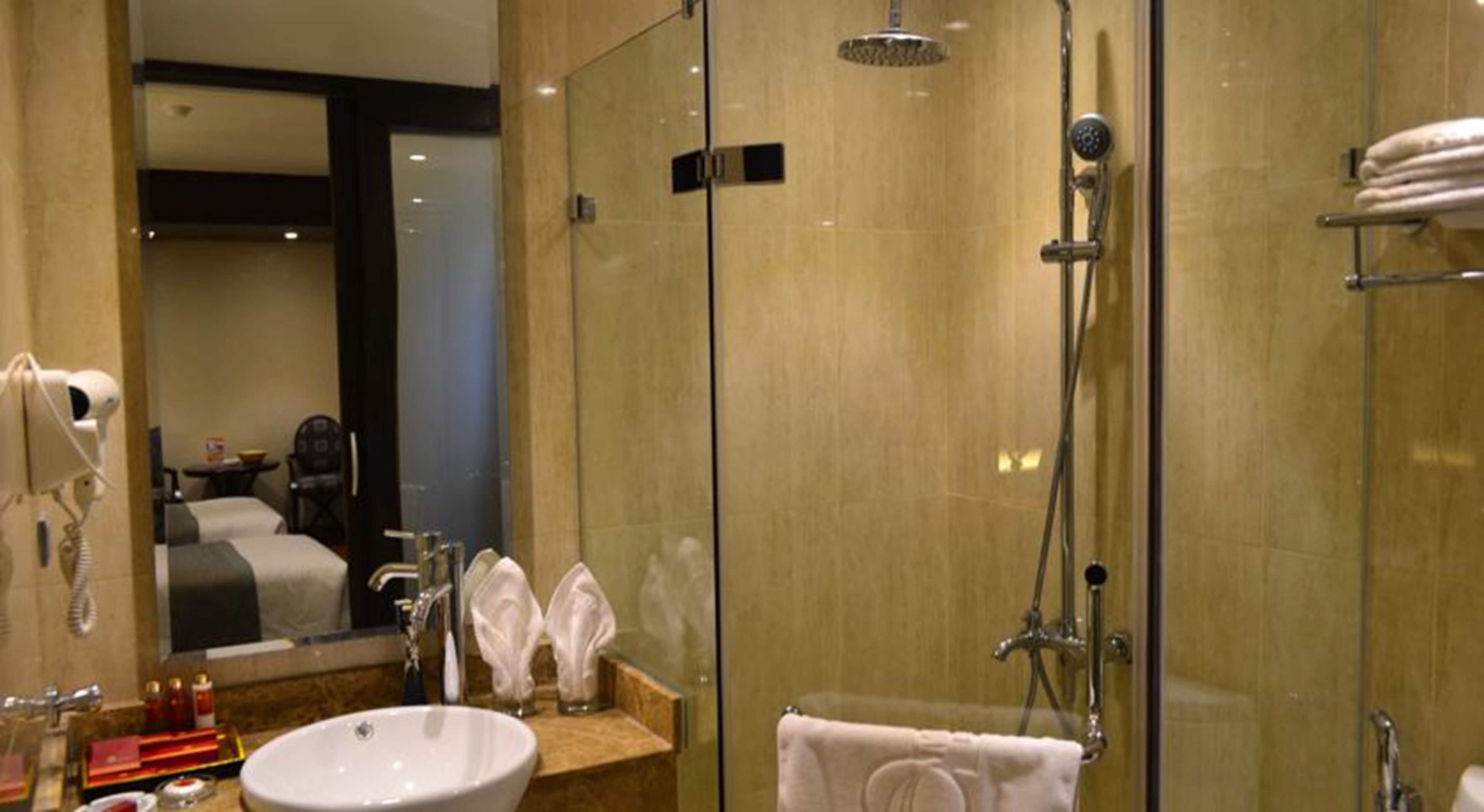 designer toiletries, slippers, towels