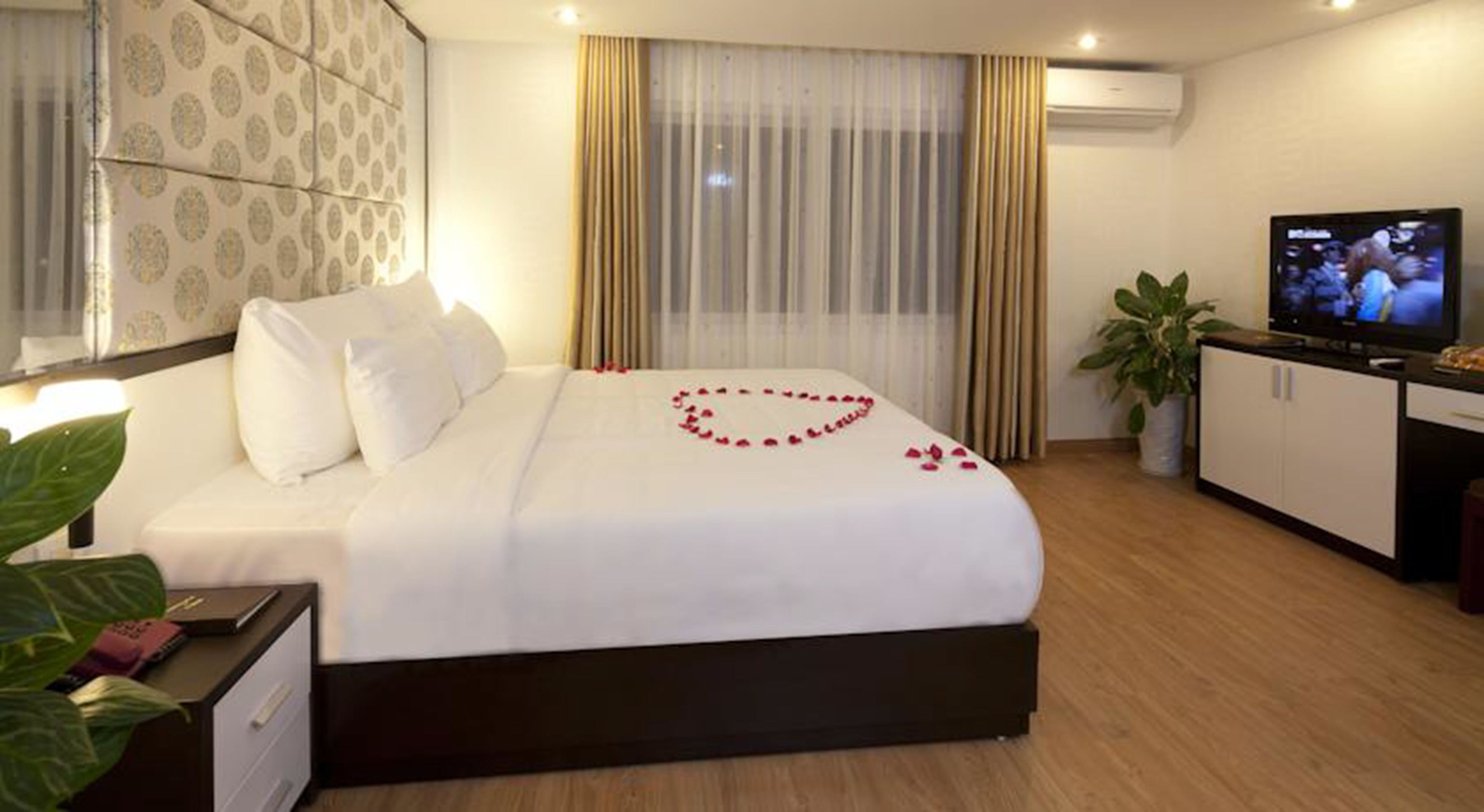 Habitación Deluxe, vistas a la ciudad | Minibar, caja fuerte, sistema de insonorización y wifi gratis