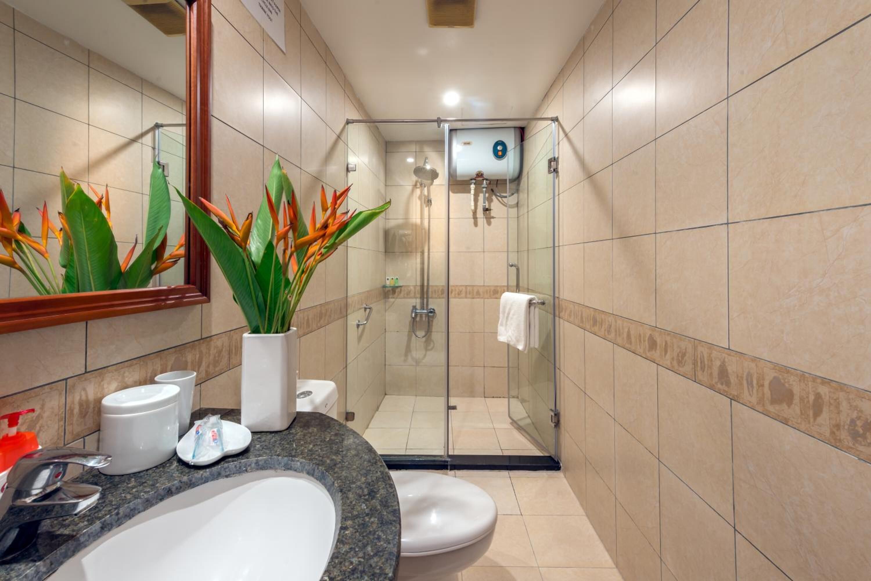 designer toiletries, slippers, towels