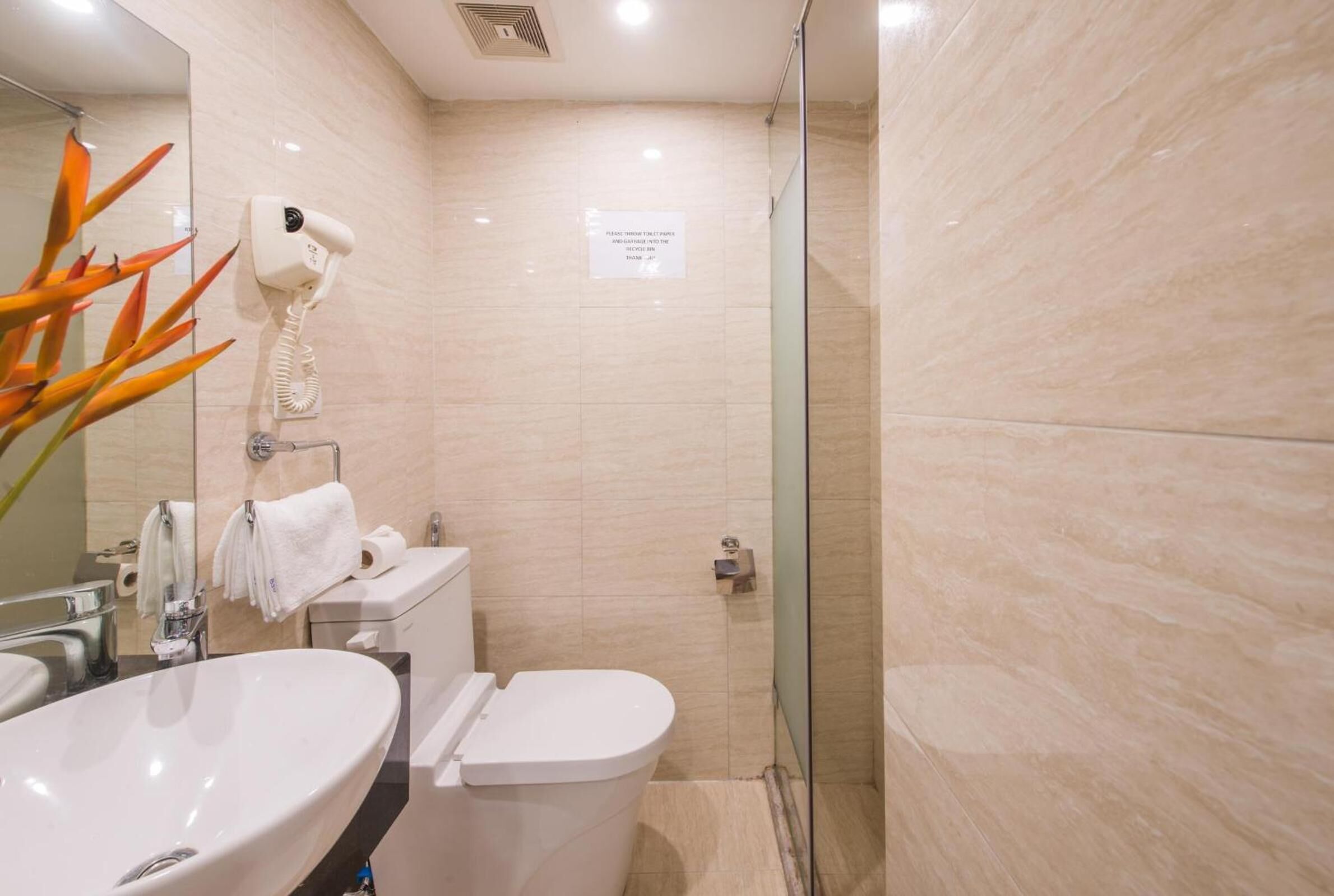 designer toiletries, slippers, towels