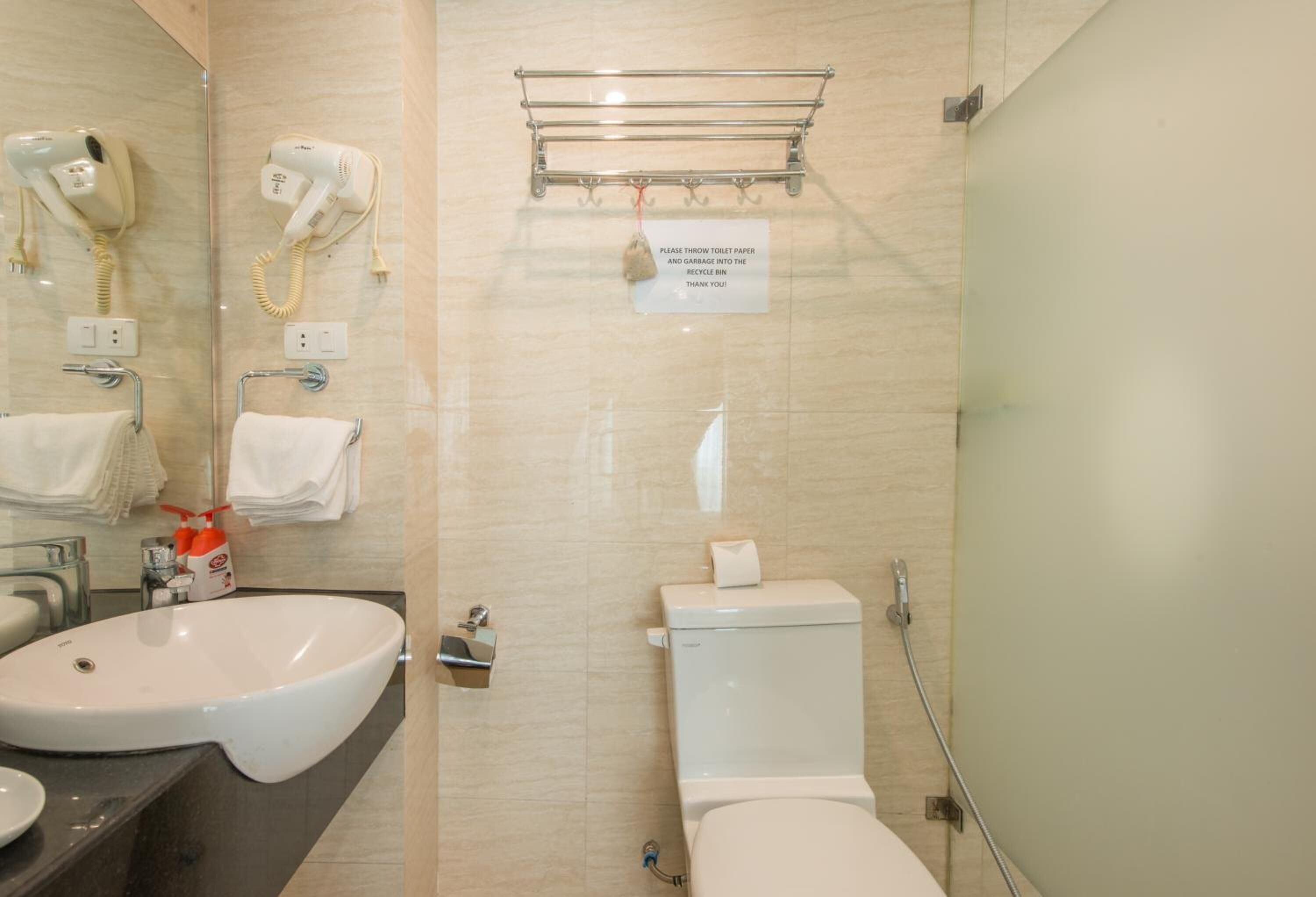 designer toiletries, slippers, towels