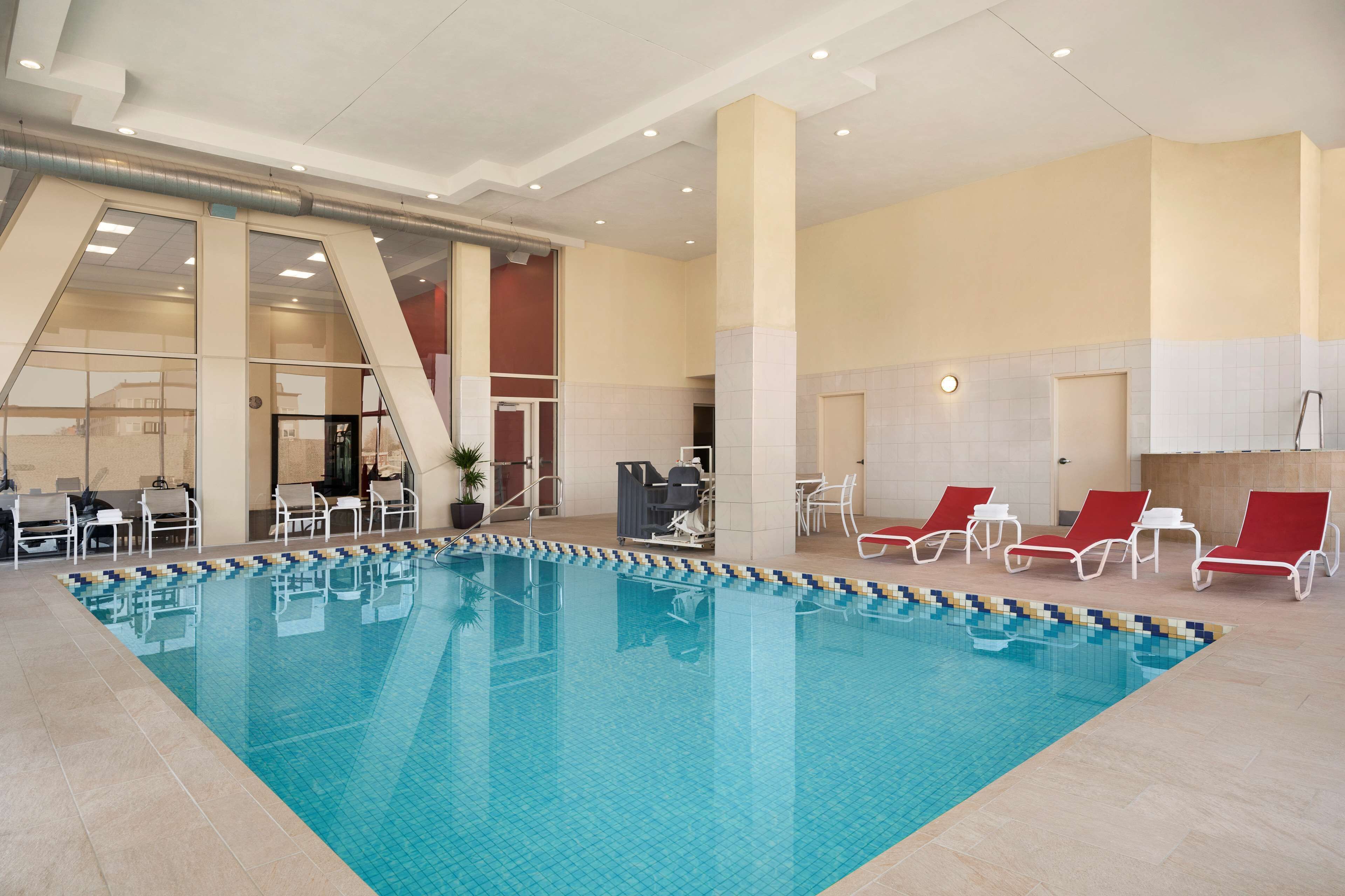 indoor pool, open 9:00 am to 10:00 pm, pool loungers