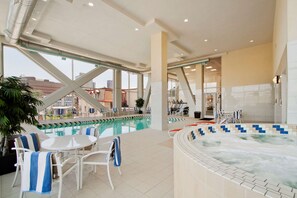 Indoor pool, open 9:00 AM to 10:00 PM, pool loungers