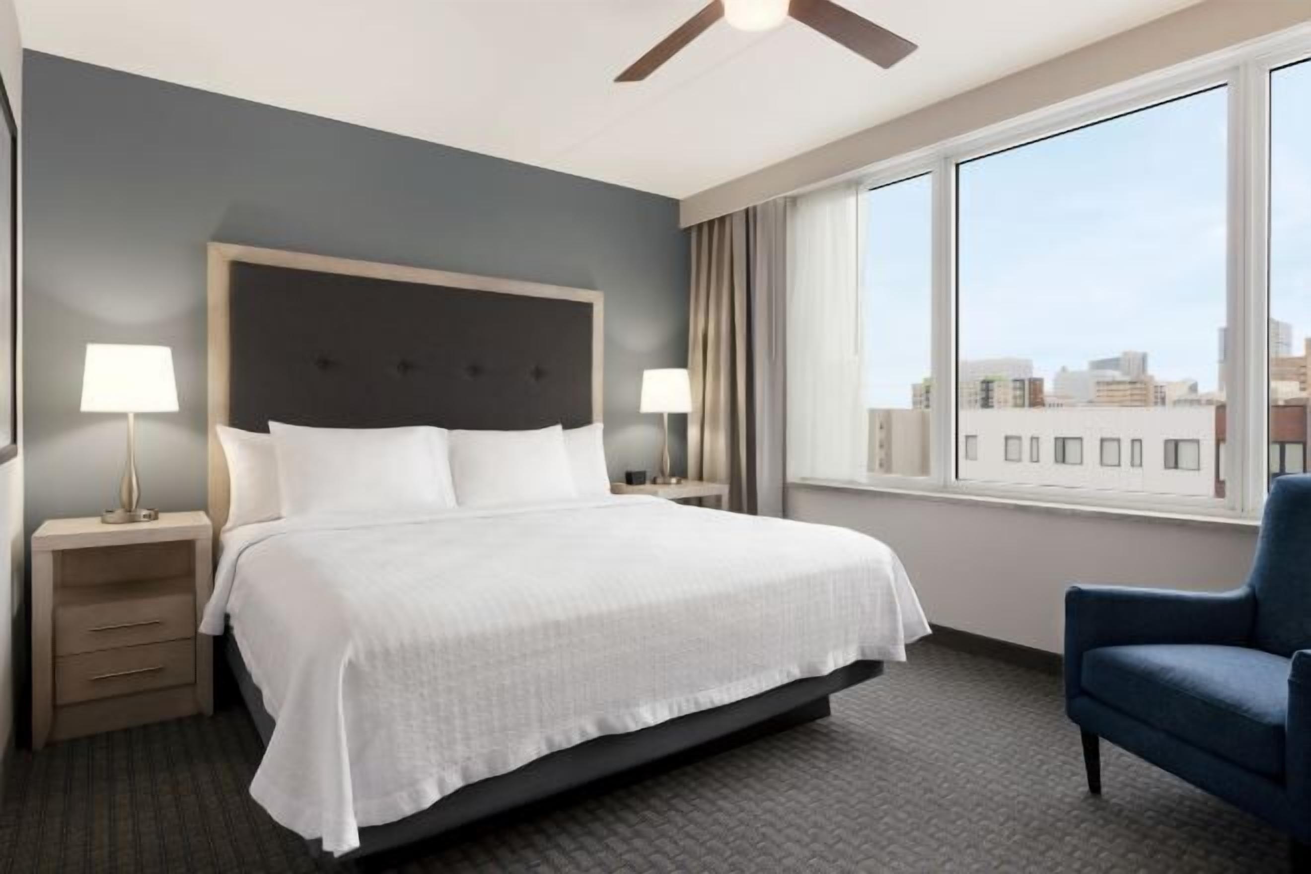 Premium bedding, blackout curtains, iron/ironing board